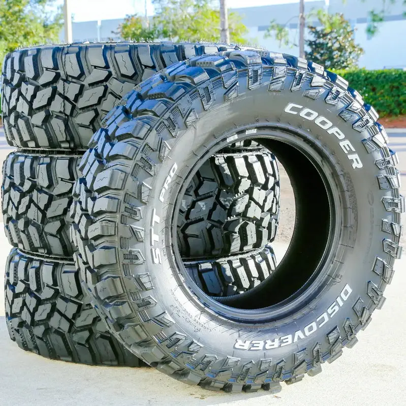 Four Cooper STT Pro LT 275/70R18 E-Rated Off-Road Mud-Terrain Tires with Bold Tread Pattern